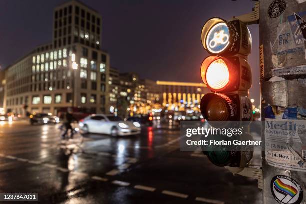 Traffic lights for cyclists are pictured during blue hour on January 10, 2022 in Berlin, Germany.