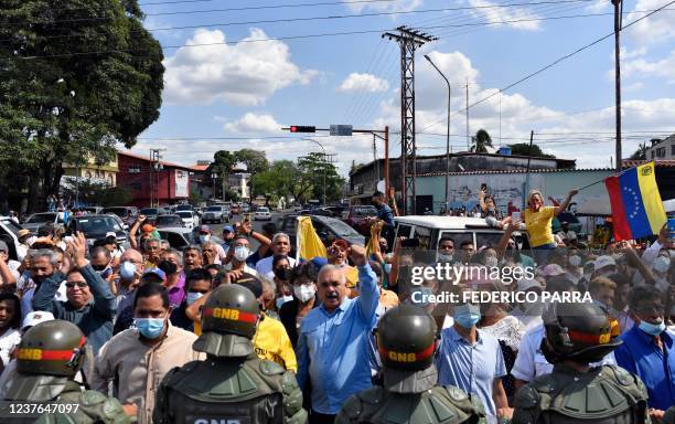 People celebrate as Barinas State elected governor, Sergio Garrido, who defeated the ruling party's candidate in Sunday's re-run of the gubernatorial...