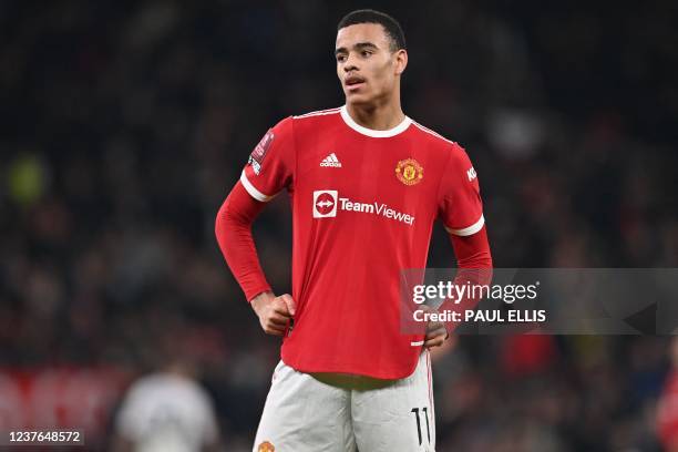 Manchester United's English striker Mason Greenwood geatures during the English FA Cup third round football match between Manchester United and Aston...