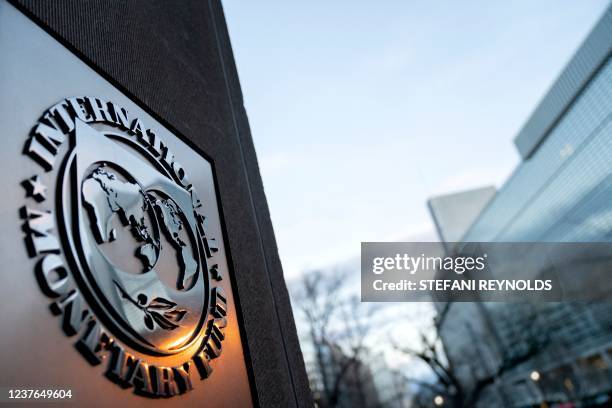 The seal for the International Monetary Fund is seen near the World Bank headquarters in Washington, DC on January 10, 2022.