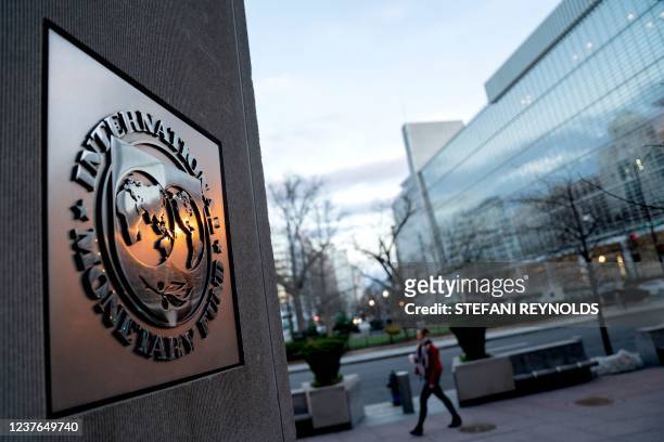 The seal for the International Monetary Fund is seen near the World Bank headquarters in Washington, DC on January 10, 2022.