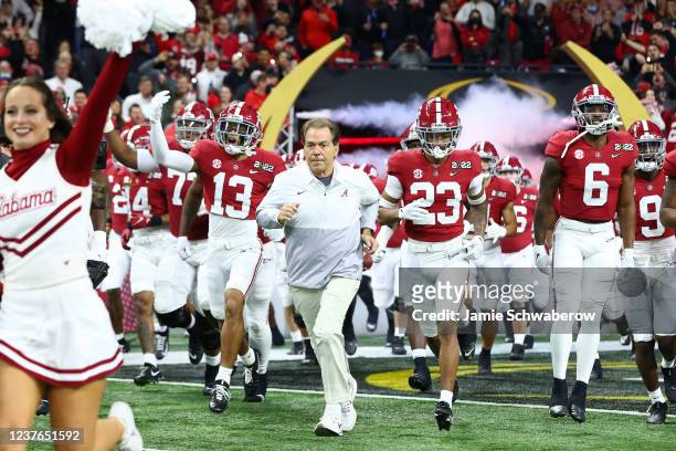 Head Coach Nick Saban of the Alabama Crimson Tide leads his team out to the field before the College Football Playoff Championship against the...