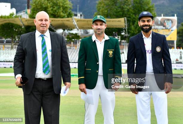 Captains Dean Elgar of South Africa and Virat Kohli of India attend the toss on day 1 of the 3rd Betway WTC Test match between South Africa and India...