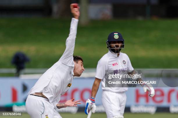 South Africa's Duanne Olivier delivers a ball as India's Virat Kohli looks on during the first day of the third Test cricket match between South...