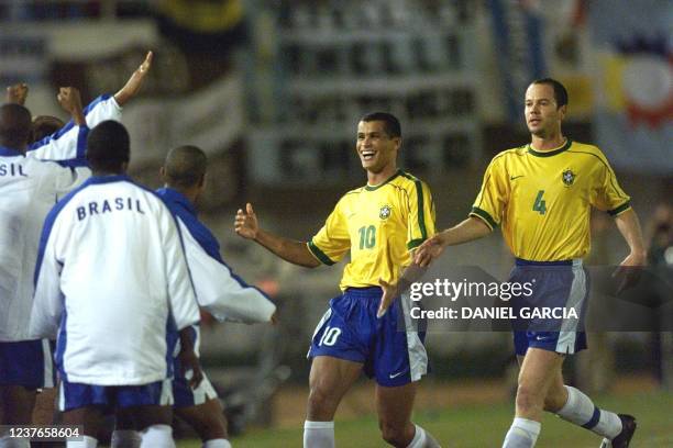 Brazil's Rivaldo celebrates with teammate Antonio Carlos after Rivaldo scored the first goal against Argentina during the Copa America quarter final...
