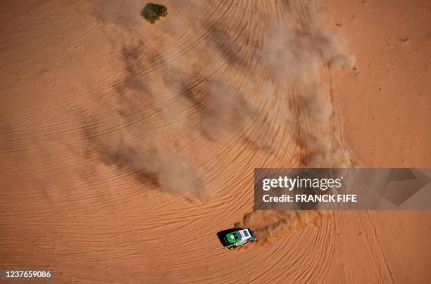 Dutch truck driver Gert Huzink and co-drivers Rob Buursen and Martin Roesink compete during the Stage 9 of the Dakar 2022 around Wadi Ad Dawasir in...