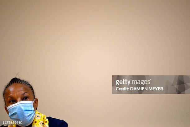 Former French Justice Minister Christiane Taubira, wearing a protective face mask, attends a meeting with Apase association leaders in Saint-Gregoire...