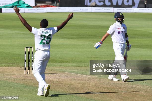 South Africa's Kagiso Rabada celebrates after the dismissal of India's Virat Kohli during the first day of the third Test cricket match between South...