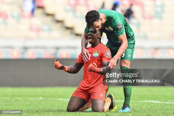 Sierra Leone's goalkeeper Mohamed Nbalie Kamara and Sierra Leone's defender Steven Caulker react after a draw in the Group E Africa Cup of Nations...