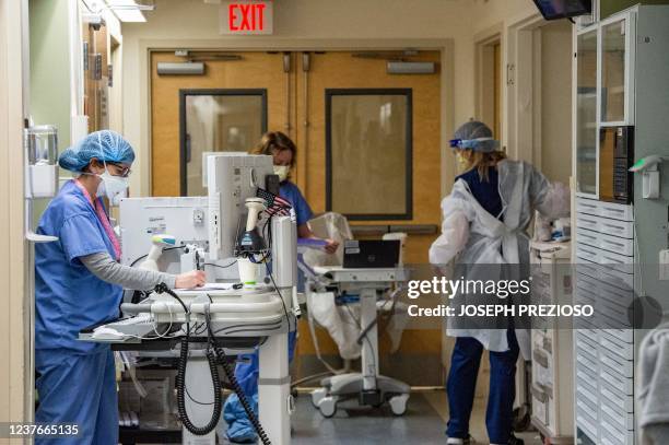 Medical workers treat patients in the Covid-19 ward at the US Department of Veterans Affairs Boston Healthcare system campus and medical center in...