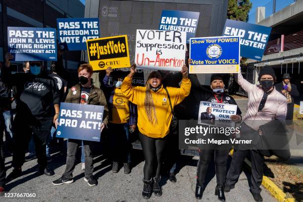 Demonstrators chant outside of the Atlanta University Center Consortium, part of both Morehouse College and Clark Atlanta University ahead of a...