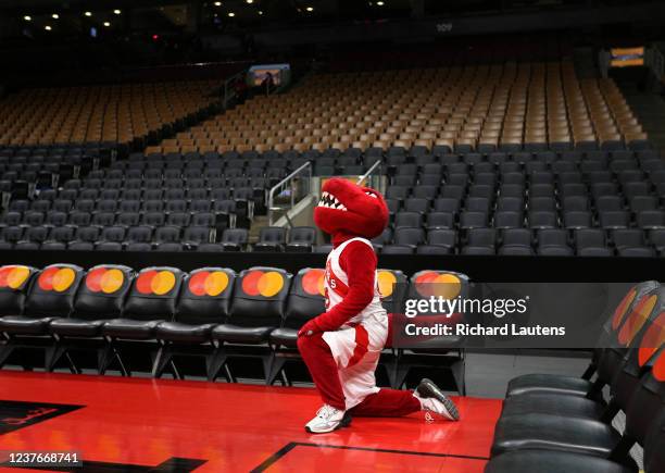 January 11 In second half action, the Raptor checks out the scoreboard in an empty arena. The Toronto Raptors lost to the Phoenix Suns 99-95 in NBA...