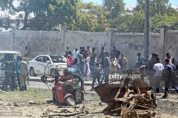 General view of the scene of a car-bomb explosion in Mogadishu on January 12, 2022 where at least six people were killed and several others wounded...