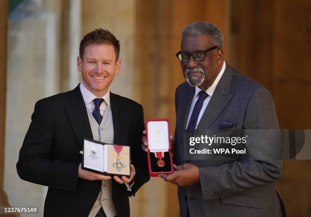 Cricketers Eoin Morgan , who received a CBE, and Sir Clive Lloyd, who received a Knighthood, after their investiture ceremony at Windsor Castle on...