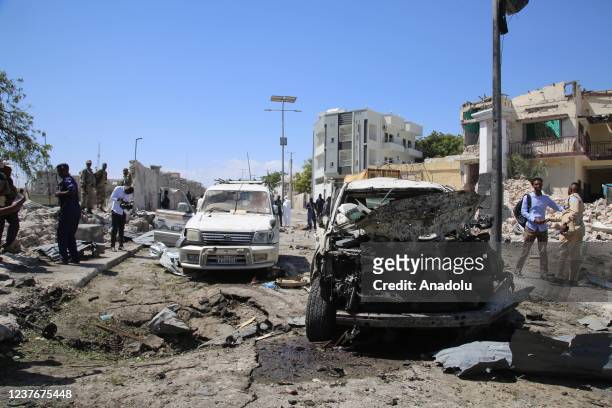 View of damage at the scene after a suicide car blast targeted a security convoy in Mogadishu, Somalia on January 12, 2022. At least 10 people...