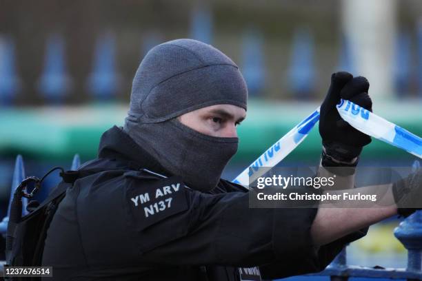 Armed Police officer in attendance during a continuing stand off with a barricaded man on January 12, 2022 in the Earlsdon suburb of Coventry,...