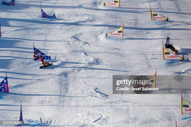 Julia Dujmovits of Austria and Natalia Soboleva of Russia compete during the Snowboard World Cup Parallel Team Slalom on January 12, 2022 in Bad...