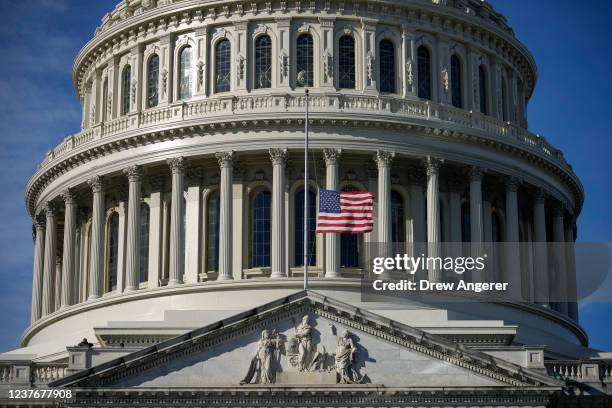 The American flag flies at half-staff at the U.S. Capitol on January 12, 2022 in Washington, DC. The body of former Senate Democratic leader Harry...