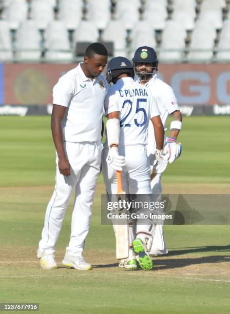 Kagiso Rabada of South Africa and Cheteshwar Pujara of India during day 2 of the 3rd Betway WTC Test match between South Africa and India at Six Gun...