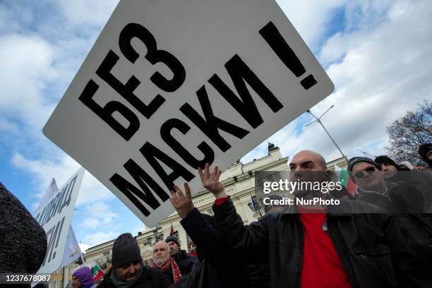 Protest in front of the National Assembly of the Republic of Bulgaria on 12 January 2022, against COVID-19 restrictions. Protesters demand the...