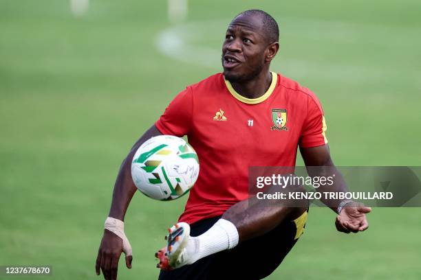 Cameroon's forward Christian Bassogog controls the ball as he takes part in a training session at the Olembe stadium in Yaounde on January 12, 2022...