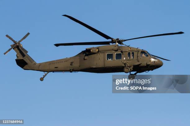 Army Sikorsky UH-60 Black Hawk helicopter coming in to land at Naval Air Facility, Atsugi near Yamato, Kanagawa, Japan.