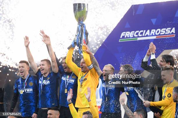Samir Handanovic of FC Internazionale celebrates the victory with the trophy during the Italian SuperCup Final match between FC Internazionale and...