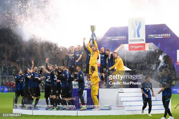 Samir Handanovic of FC Internazionale and his teammates celebrate the victory with the trophy during the Italian SuperCup Final match between FC...