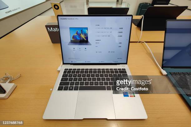 Huawei's newly released MateBook X Pro is on display at huawei's flagship store on Nanjing Road in Shanghai, China, Jan. 12, 2022.