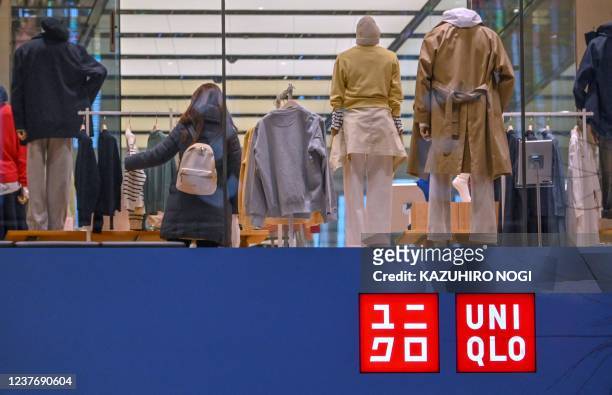This picture shows a Uniqlo store operated by Japan's Fast Retailing in Tokyo on January 13, 2022.