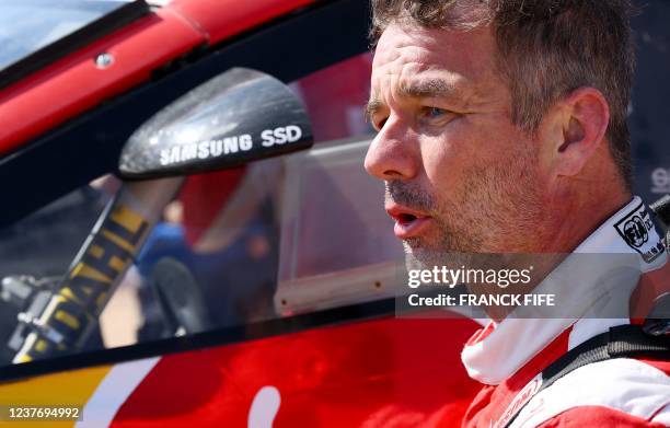 French driver Sebastien Loeb reacts during the Stage 11 of the Dakar 2022 around Bisha, Saudi Arabia, on January 13, 2022.