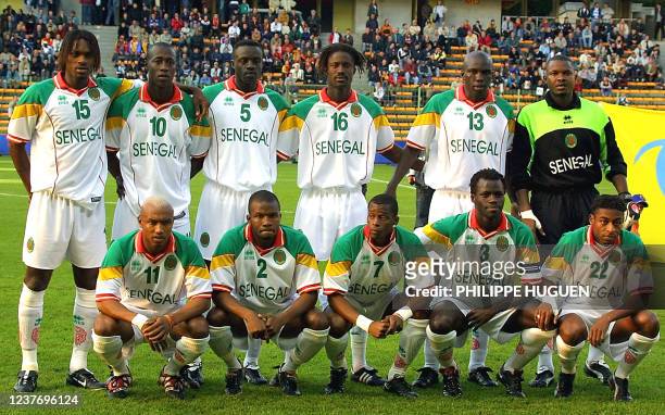 Senegal's national soccer team players pose for a group picture at Bollaert stadium in Lens 04 October 2001 before the start of their friendly match...