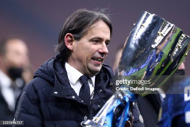 Head coach Simone Inzaghi of FC Internazionale with the Supercoppa Italiana trophy after the italian SuperCup match between FC Internazionale and...