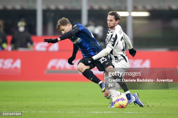 Adrien Rabiot of Juventus and Nicolo Barella of Internazionale during the italian SuperCup match between FC Internazionale and Juventus at Stadio...