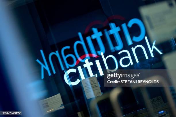 The Citibank logo is reflected in a window in Washington, DC, on January 13, 2022.