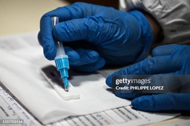 Health worker performs an Covid-19 antigenic test available on the premises of the Fenelon Notre-Dame school complex in La Rochelle, south-western...