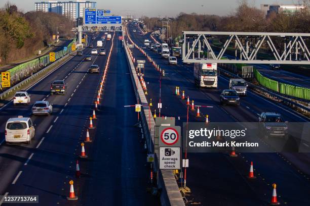 Traffic passes along a section of the M4 which is currently being converted to a smart motorway on 13th January 2022 in Langley, United Kingdom. The...