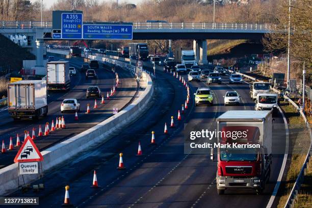 Traffic passes along a section of the M4 which is currently being converted to a smart motorway on 13th January 2022 in Slough, United Kingdom. The...