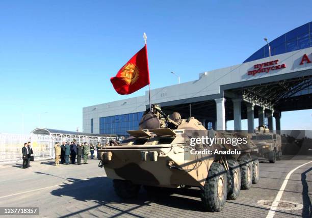 Kyrgyz soldiers with armoured vehicles are seen as they are returning from Almadi province of Kazakhstan after one week, in Bishkek, Kyrgyzstan on...