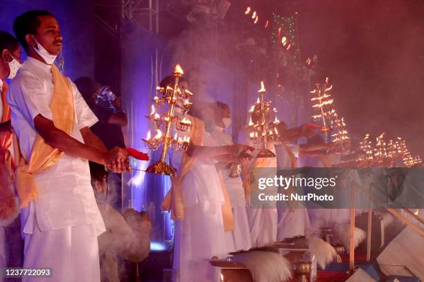 Hindu priest performed Sagar Arati on at the confluence of the Ganges River and the Bay of Bengal during the Gangasagar Mela on the occasion of Makar...