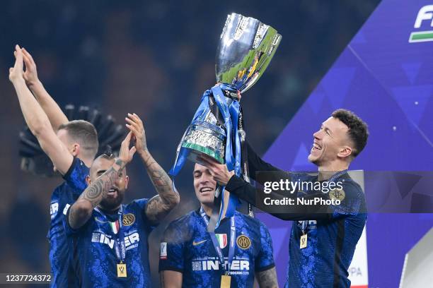 Ivan Perisic of FC Internazionale rises up the trophy with his teammates winning the Italian SuperCup Final match between FC Internazionale and...