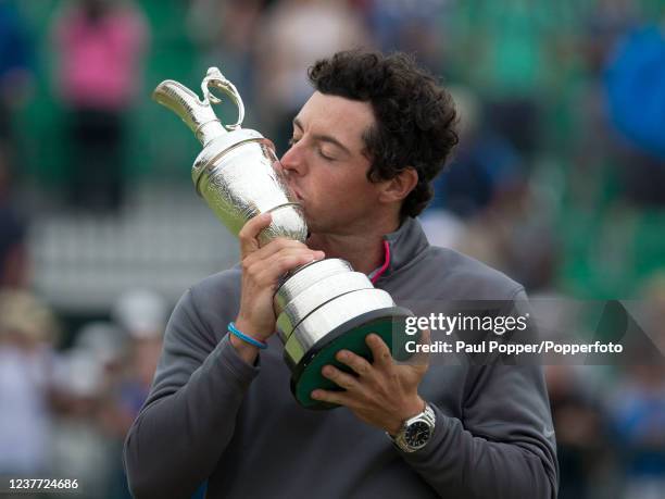 Rory McIlroy of Northern Ireland celebrates with the trophy after his two-stroke victory in the 143rd Open Championship at Royal Liverpool Golf Club...