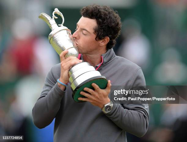 Rory McIlroy of Northern Ireland celebrates with the trophy after his two-stroke victory in the 143rd Open Championship at Royal Liverpool Golf Club...