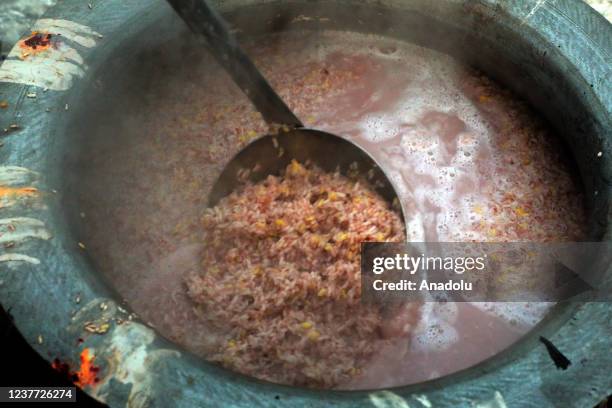 The Pongal or rice mixed with candy and other pulses being prepared on Thai Pongal day at the Shri Ponnambalawaneswaram Kovil in Colombo, Sri Lanka...