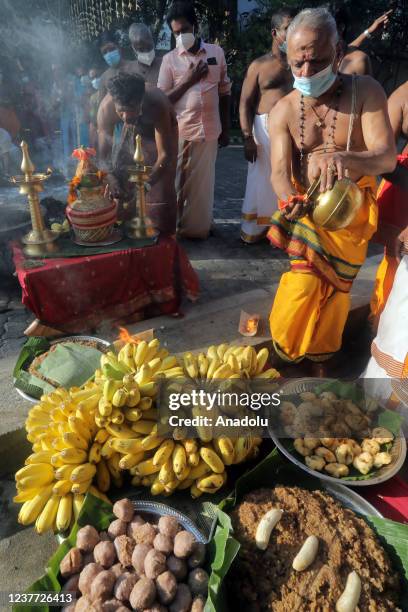 The Pongal rice and fruits ready to be distributed after religious rites on Thai Pongal day at the Shri Ponnambalawaneswaram Kovil in Colombo, Sri...