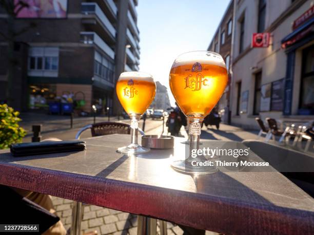 Three beers are waiting to be drunk on a table in a pub of Place Jourdan on January 14, 2022 in Brussels, Belgium.