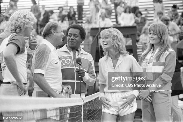 In center, from left,( Dick Van Patten, Flip Wilson, Farrah Fawcett and Valerie Perrine, during the tennis portion of the television special:...