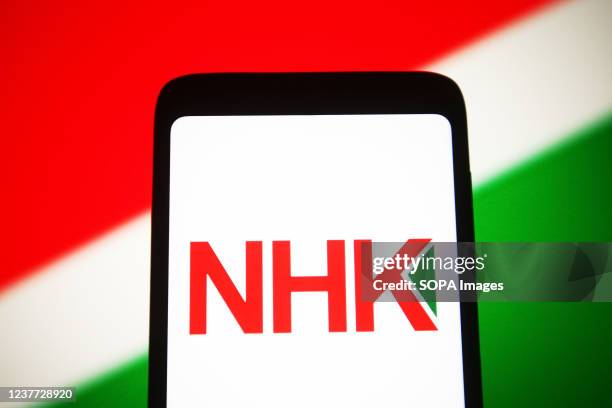 In this photo illustration, a NHK Spring Co. Ltd. logo is seen on a ...