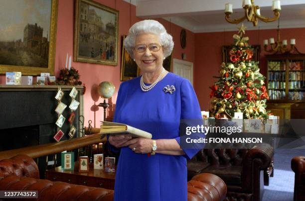Queen Elizabeth II at Combermere Barracks in Windsor 08 December 2003, where she recorded her Christmas Day message to the Commonwealth. POOL ROTA PA