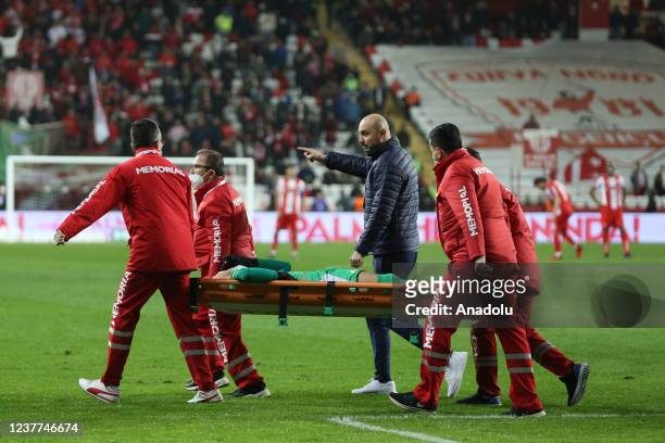 Goalkeeper Berke Ozer of Fenerbahce suffers an injury during the Turkish Super Lig week 21 soccer match between Fraport TAV Antalyaspor and...